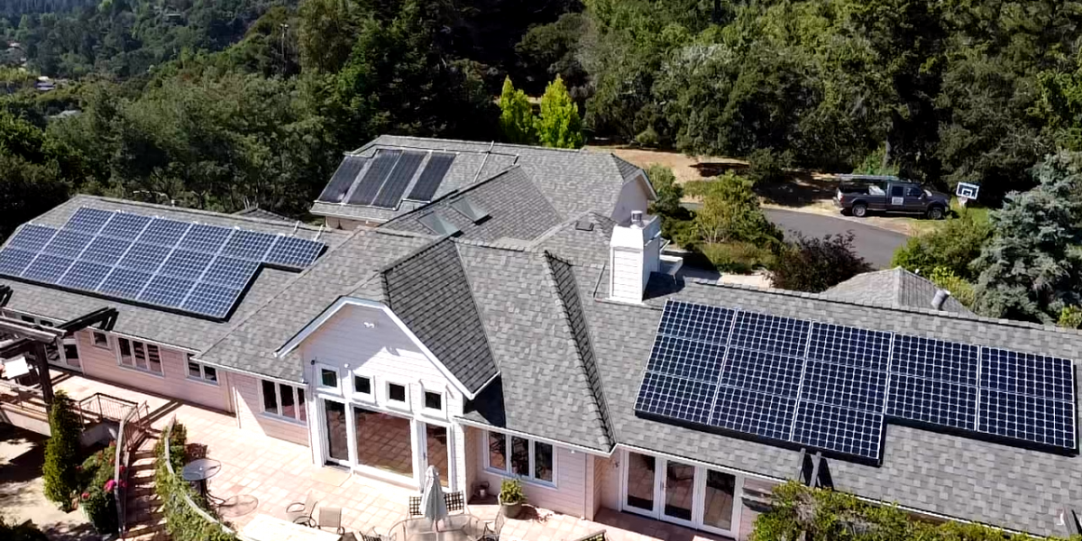 Asphalt shingle roof install in Santa Cruz California installed with solar panels completed by Redwood Roofs