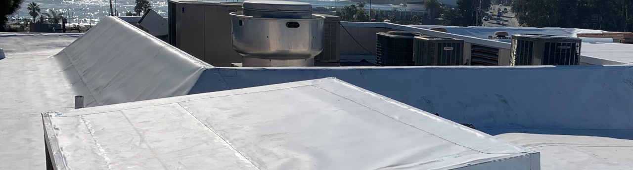 Featured commercial flat roof installed by top roofing company in Santa Cruz