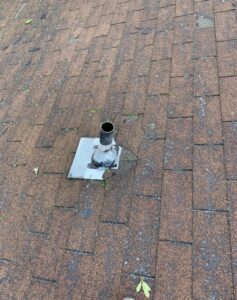 Moderate granule loss and missing asphalt shingles on a roof in Aptos California