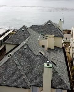 Multi pitch asphalt shingle roof installed near the coast by local roofing company in Santa Cruz CA