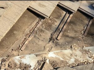 Roof valley that has been left unkept causing roof failure Roof valley in Capitola California that has been left unkept causing roof failure. A quality roofing company will be required to help fix these issues.